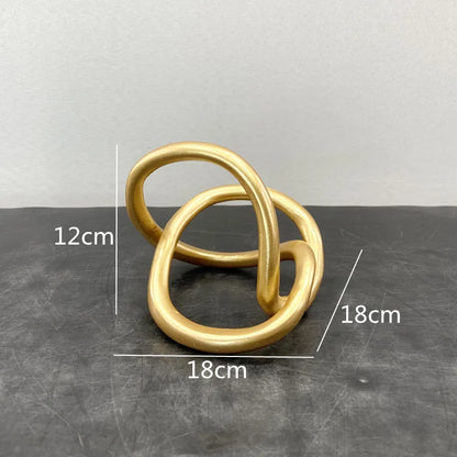 Decorbites™ Goldener Ringknoten Geometrische Harzornamente Handgefertigte Kunstdekoration Figuren