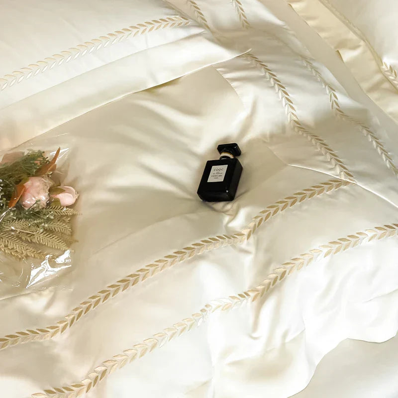 Decorbites™ Besticktes Eisbettwäsche-Set: Weiche Daunendecke, Laken, Kissenbezüge 4Stk