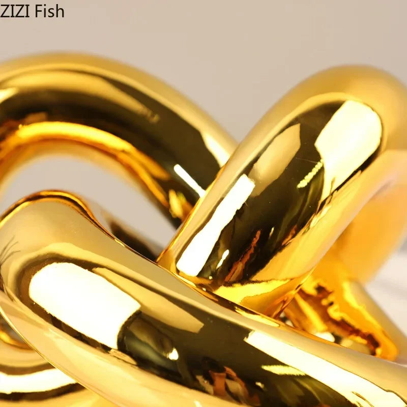 Decorbites™ Vergoldete Knotenornamente: Moderne geometrische Harz-Schreibtischdekoration & Raumhandwerk