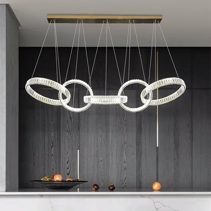 Modern gold-toned decorbites crystal chandelier pendant light with clear faceted crystals for living room ceiling lighting