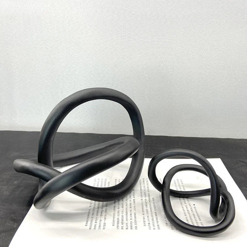 Decorbites™ Goldener Ringknoten Geometrische Harzornamente Handgefertigte Kunstdekoration Figuren
