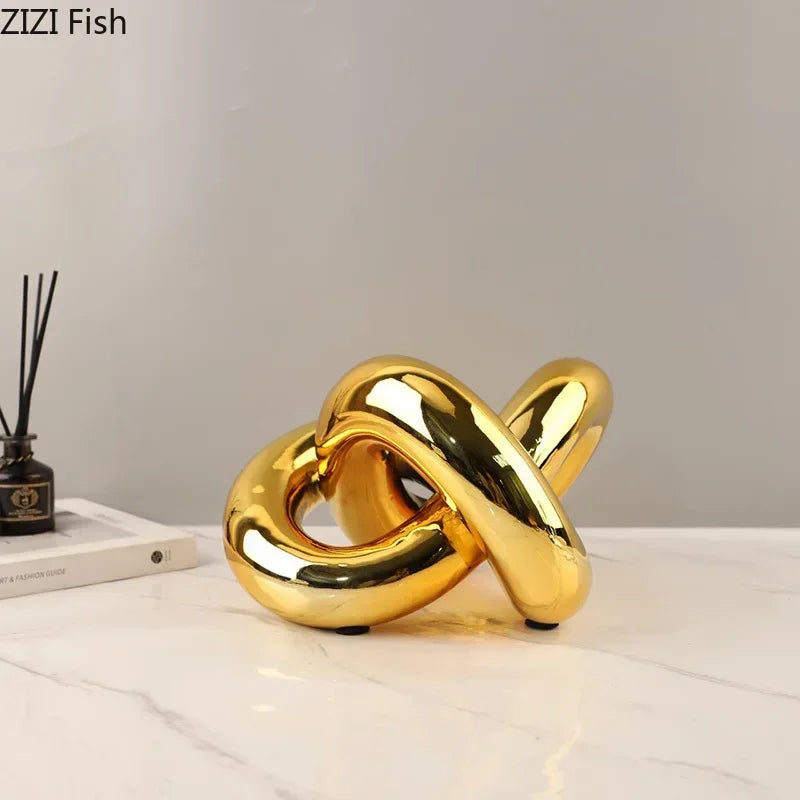 Decorbites™ Vergoldete Knotenornamente: Moderne geometrische Harz-Schreibtischdekoration & Raumhandwerk