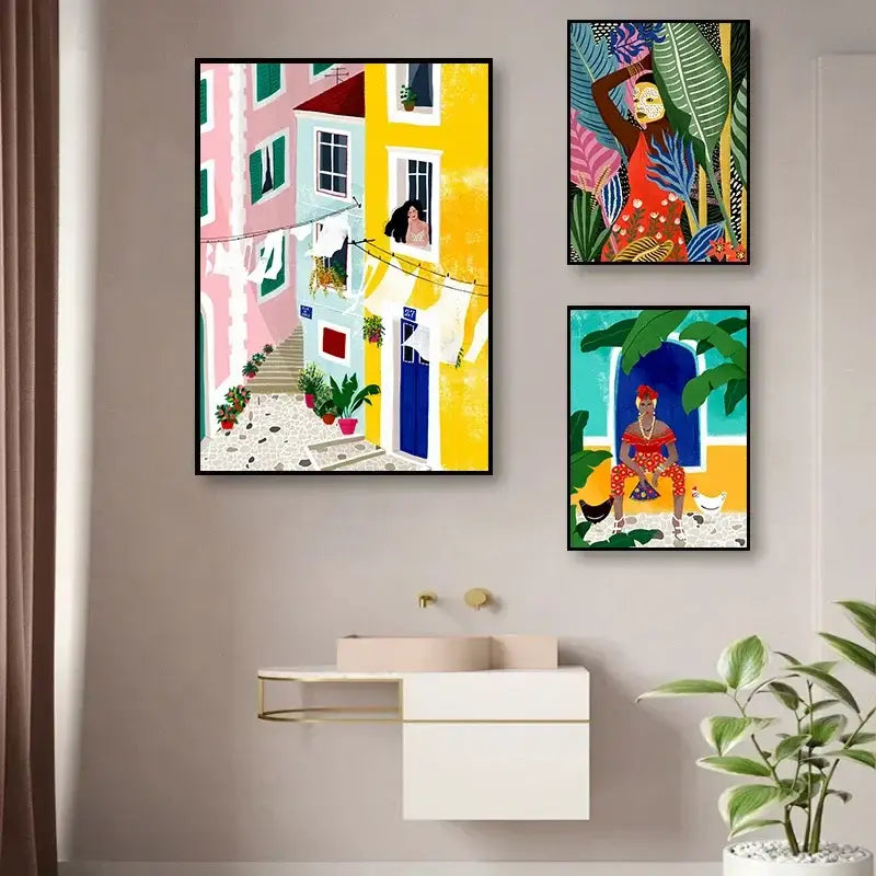 Three colorful abstract beach body canvas prints framed and displayed above a white modern vanity for home decor