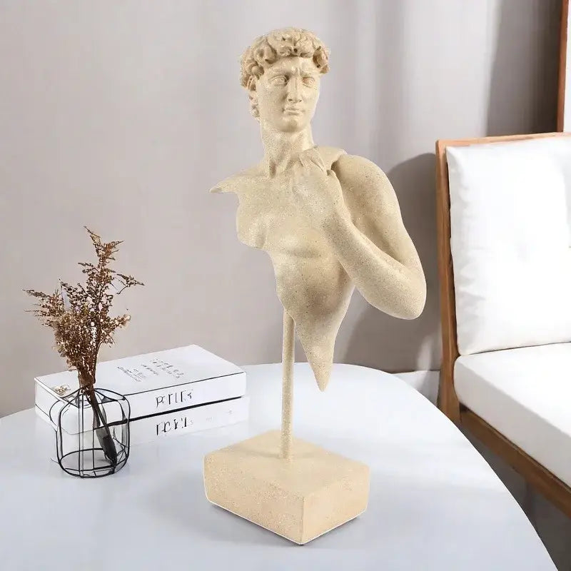 Beige david bust resin sculpture with curly hair and draped fabric on a rectangular base for living room decor
