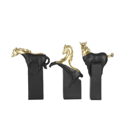 Three black and gold resin decorbites horse statues on sleek rectangular bases for elegant living room decor