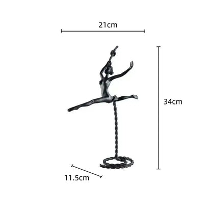 Black metal ballerina dancer sculpture balancing mid-air on a twisted rope loop for living room decorbites decor