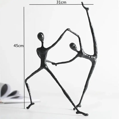 Abstract black metal sports figure sculpture of two dancing figures 45cm tall 31cm wide decorbites black metal decor