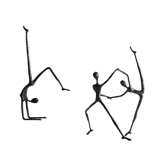 Abstract black metal sports figure sculpture by decorbites featuring two dynamic stylized human forms for living room decor