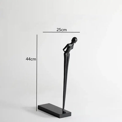 Abstract black metal sports figure sculpture in matte black finish with minimalist design for living room decorbites black metal