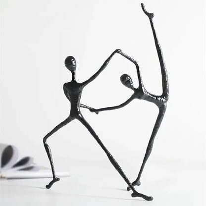 Abstract black metal sports figure sculpture of two stylized dancing figures for living room decorbites decor