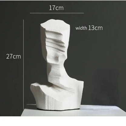 White abstract resin decoration sculpture with textured layered surfaces in modern minimalist geometric design
