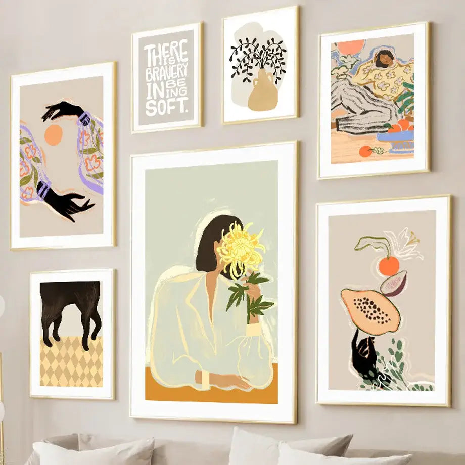 A set of six framed wall art prints featuring abstract girl hand and botanical designs in soft pastel colors for living room decor