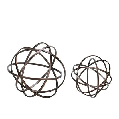 Abstract bronze geometric sphere pendant sculpture featuring metal wire spheres with interwoven circular bands for decor