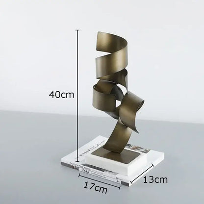 Abstract bronze irregular crimp metal sculpture with spiral ribbon design on white base for living room decor