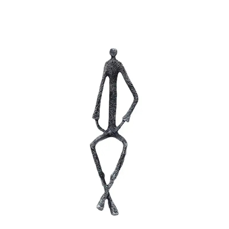Abstract bronze metal human sculpture featuring a slender figure with crossed arms and legs for decorbites abstract metal decor