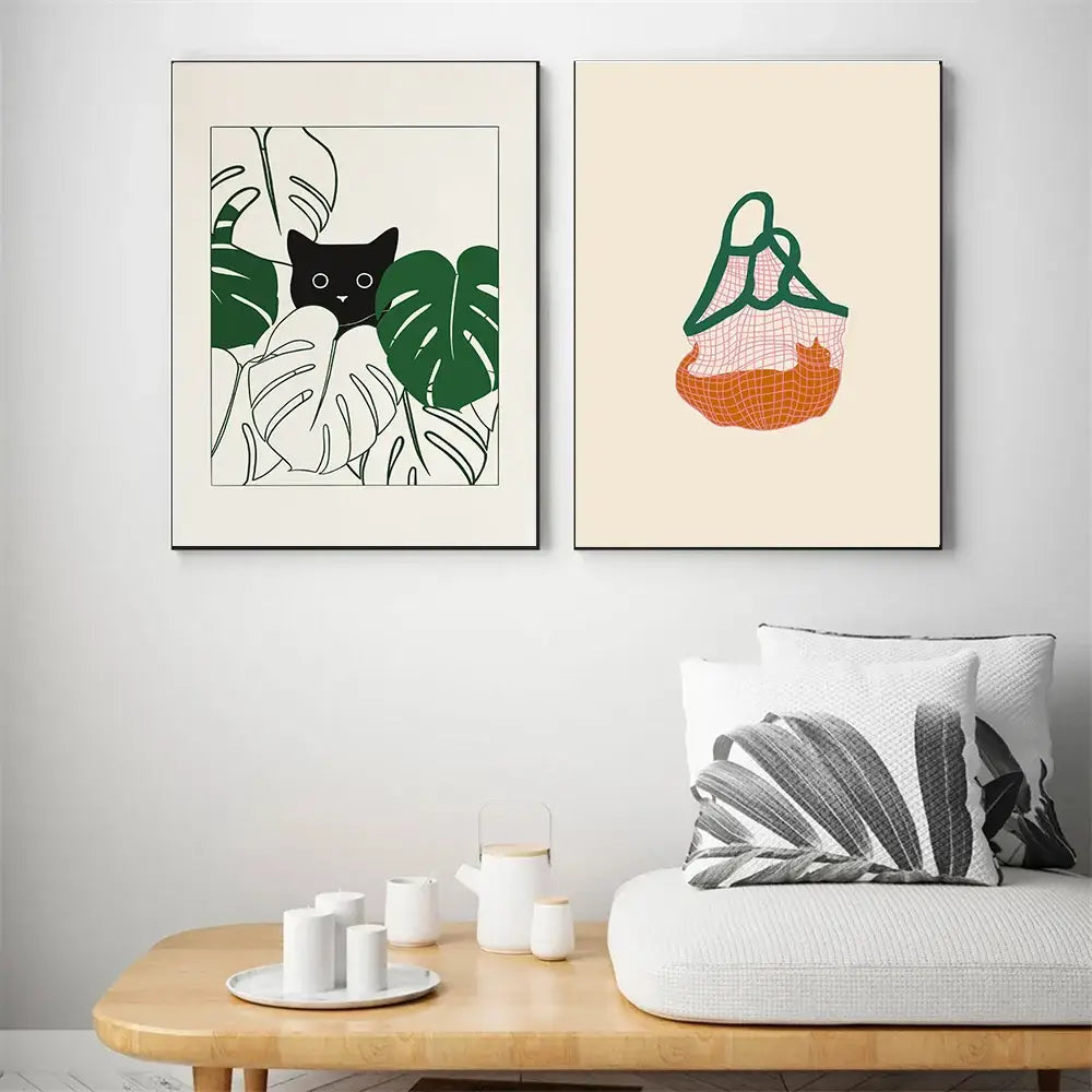 Two minimalist framed canvas art prints featuring a lazy cat illustration and an orange mesh bag by DecorBites™