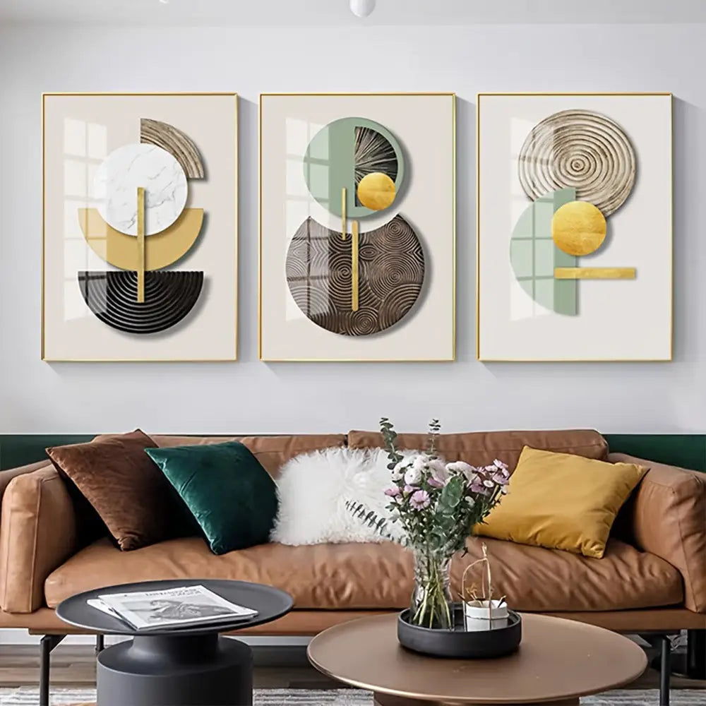 Set of three DecorBites™ abstract geometric canvas art pieces with gold, black, white, and muted green tones framed in gold