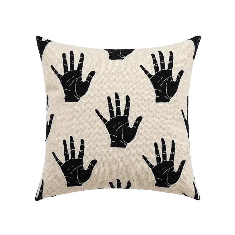 Beige cushion cover with black hand print pattern designed for decorbites abstract handmade living room decor