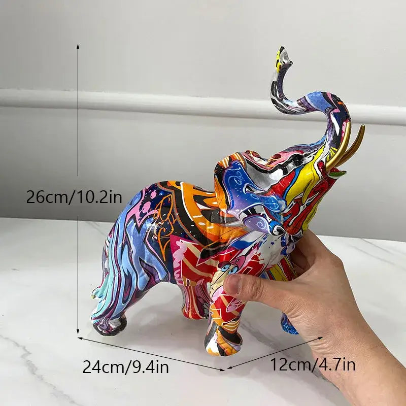 Vibrant abstractly painted decorbites elephant resin art statue with glossy multicolored patterns for living room decor