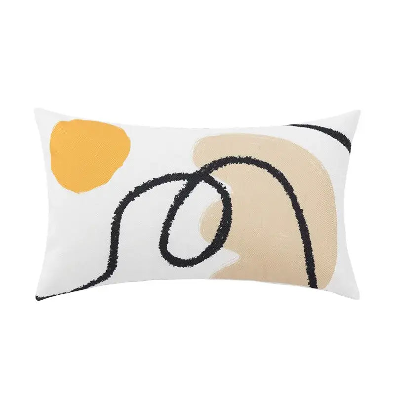White rectangular pillow cover with decorbites abstract geometric print featuring yellow circle and black brushstroke lines