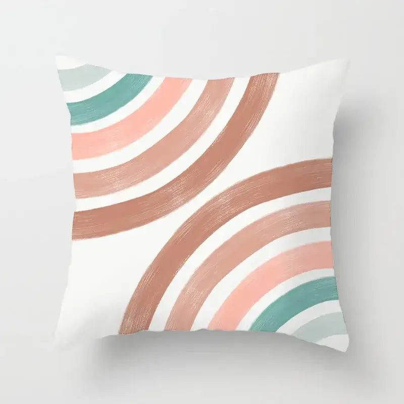 A square pillow cover with abstract geometric stitch print featuring peach, muted teal, and white decorbites design