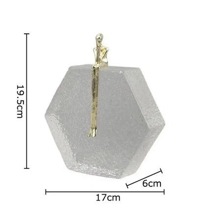 Abstract gold intertwined figures desk decor with a translucent hexagonal resin base decorbites crystal sculpture