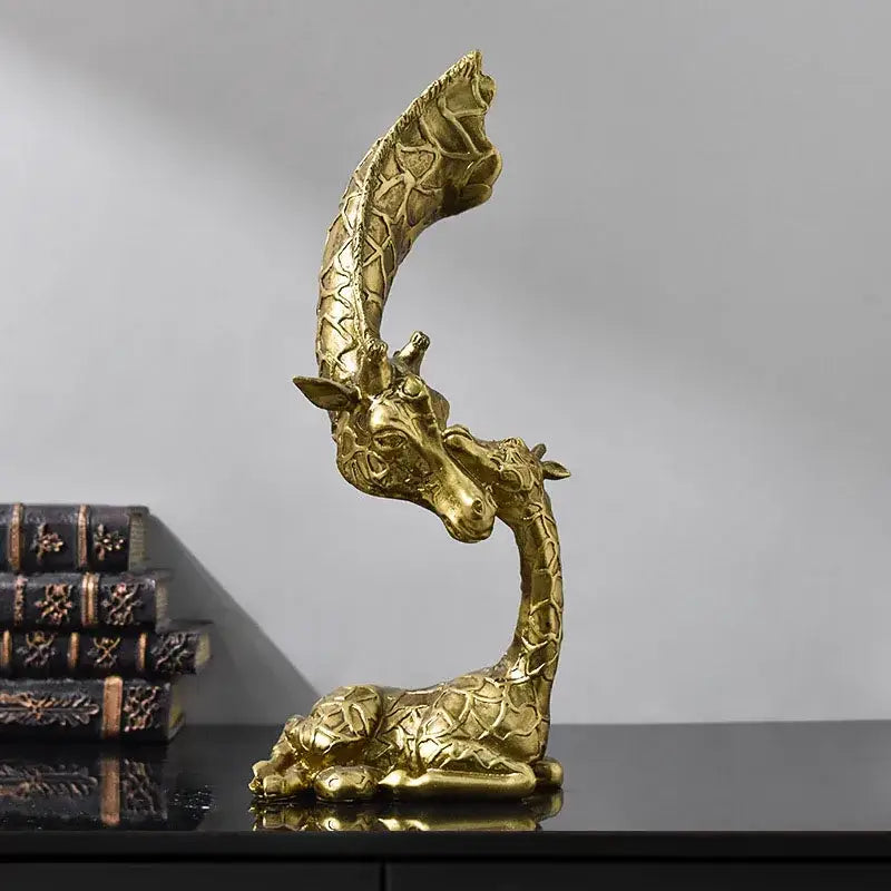 Golden abstract resin giraffe figurine with intricate textured pattern and curved neck for living room decorbites decor