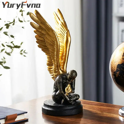 Abstract golden character winged angel resin statue with dark bronze body holding small golden bird for living room decorbites decor