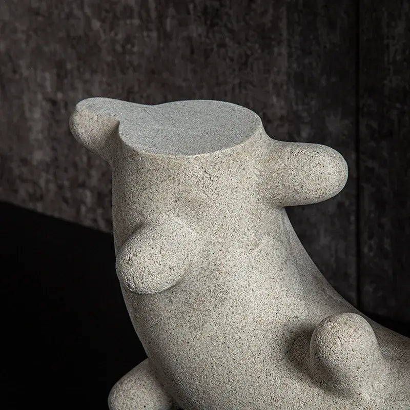 Gray stone geometric cactus resin sculpture with rounded features and textured surface for living room decor