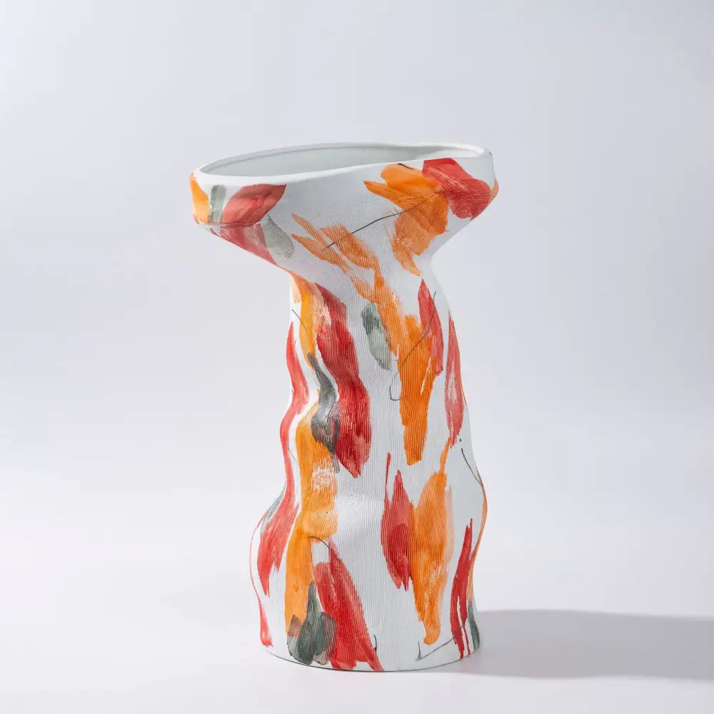 A white ceramic abstract irregular vase set with vibrant orange and red brushstrokes for living room decorbites decor