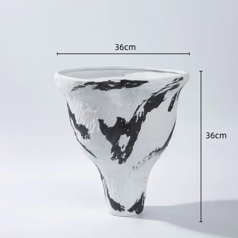 White ceramic vase with bold black brushstroke patterns and textured surface in abstract irregular vase set decorbites abstract irregular