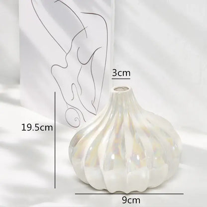 Glossy white decorbites ceramic shell vase with fluted segmented design and iridescent glaze for living room decor