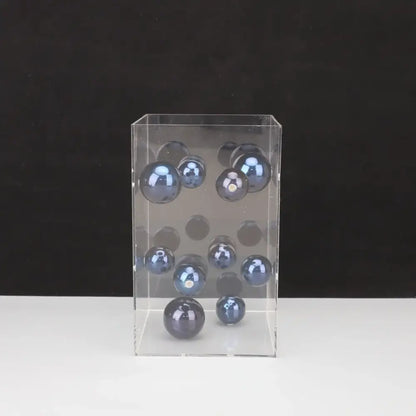 Clear acrylic display case with glossy dark blue glass spheres for decorbites abstract metal ball artworks cube decor
