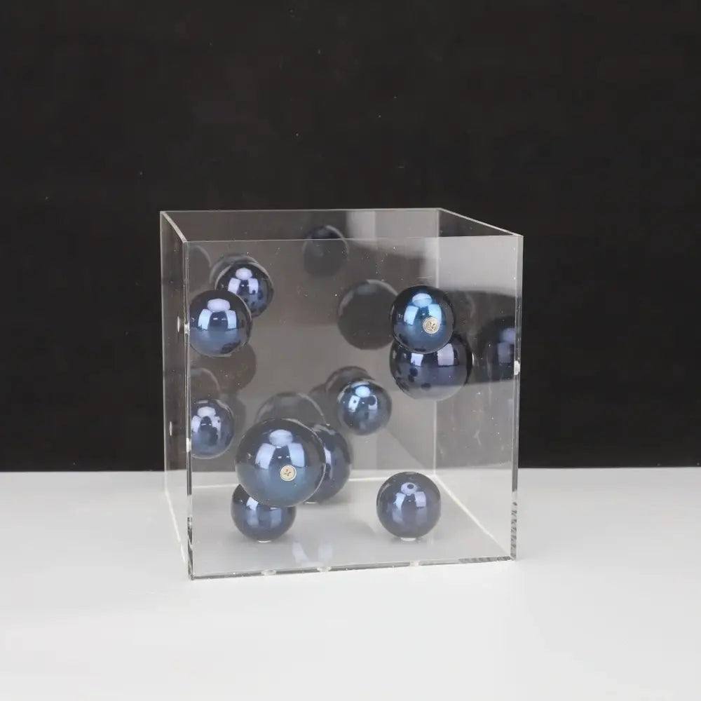 Clear acrylic cube with glossy dark blue spheres featuring decorbites abstract metal ball artworks for living room decor