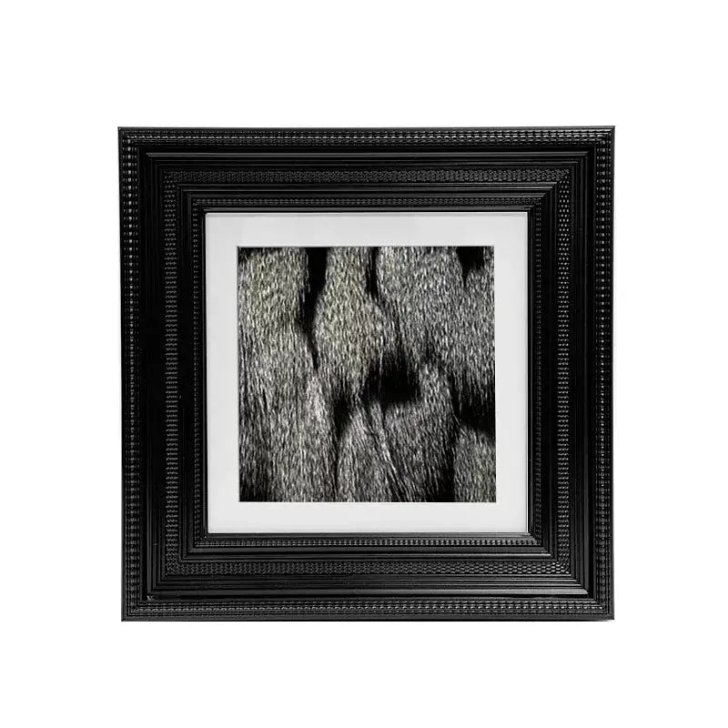 Black ornate picture frame with white mat holding black and white textured fur pattern photo for abstract modern wall art decorbites abstract modern