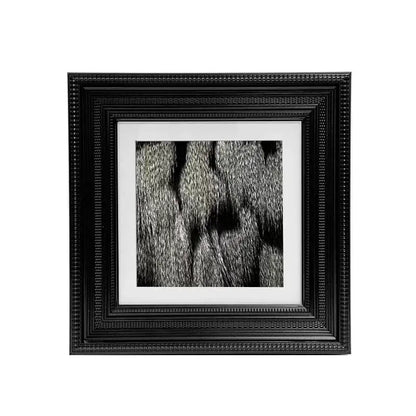 Black ornate picture frame with white mat holding black and white textured fur pattern photo for abstract modern wall art decorbites abstract modern