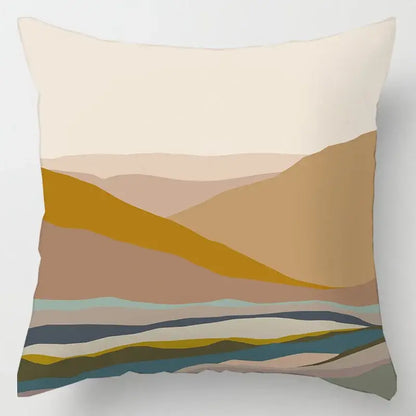 A square cushion cover with geometric leaves print featuring layered beige, ochre, brown, and soft teal tones