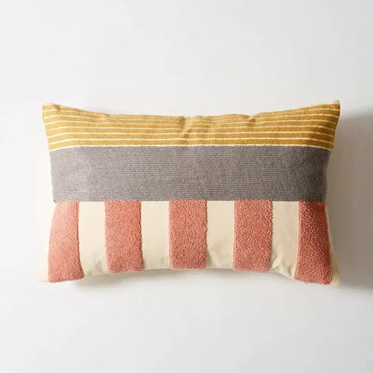 Abstract pastel geometric cushion cover featuring a rectangular decorbites geometric cushion with mustard yellow gray and terracotta stripes on cream background
