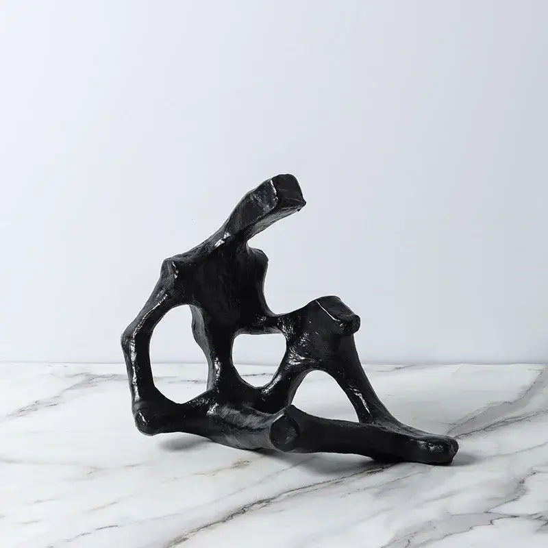 Black abstract skeleton decor figure sculpture with organic branches and glossy finish for living room bookends