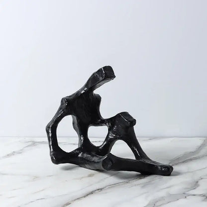 Black abstract skeleton decor figure sculpture with organic branches and glossy finish for living room bookends