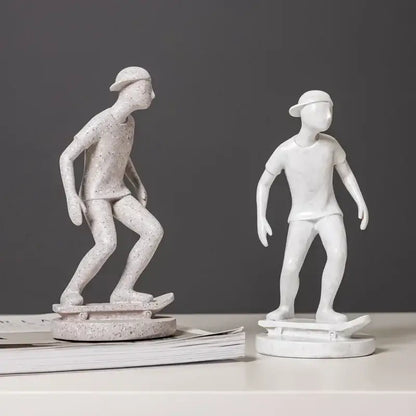Two white resin abstract sports player sculptures with smooth and speckled textures for grey and white decorbites decor