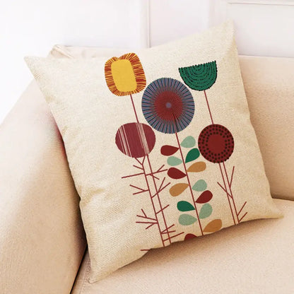 Beige linen pillow cover with abstract tree flower embroidered yellow green blue and red floral design for living room decorbites
