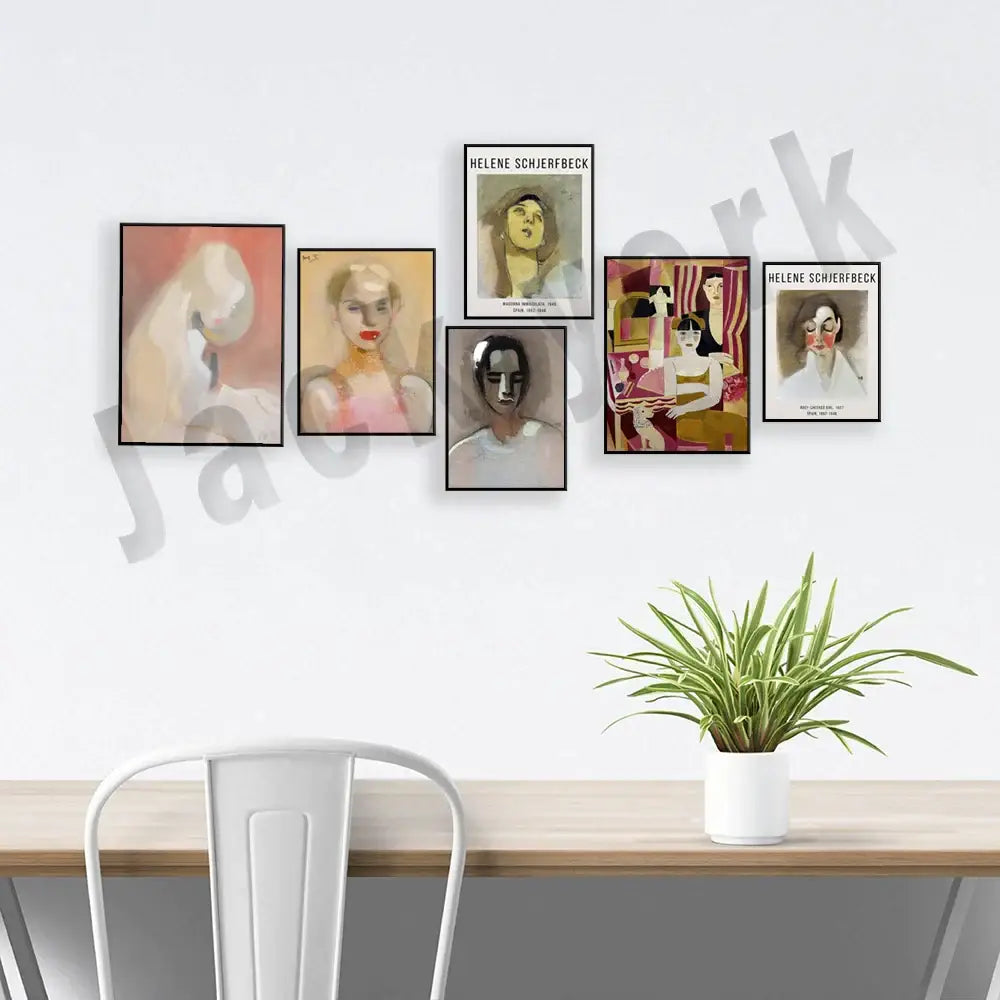 White ceramic planter holding green spider plant displayed with decorbites abstract vintage exhibition poster set art prints