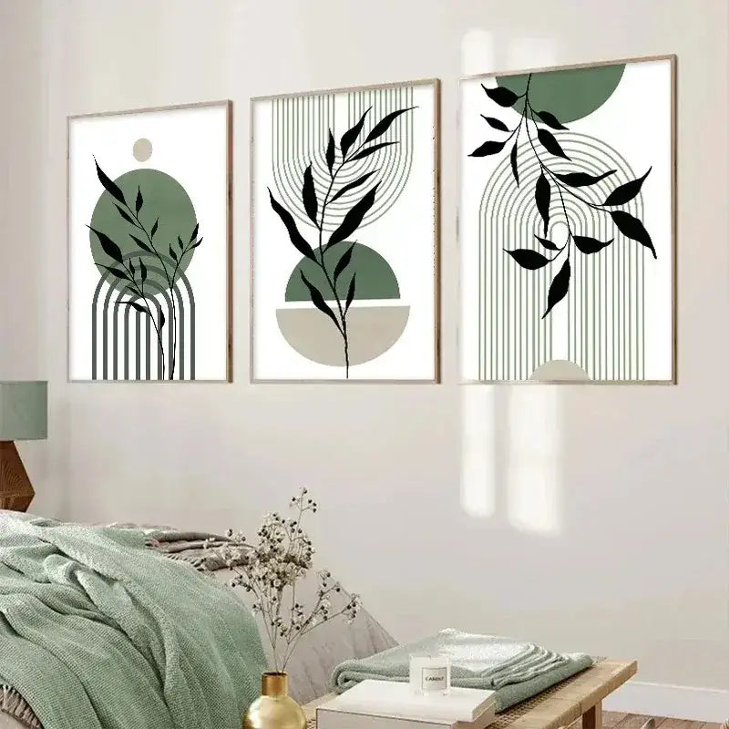 Three framed minimalist botanical art prints with black leaf silhouettes on abstract green and beige geometric backgrounds