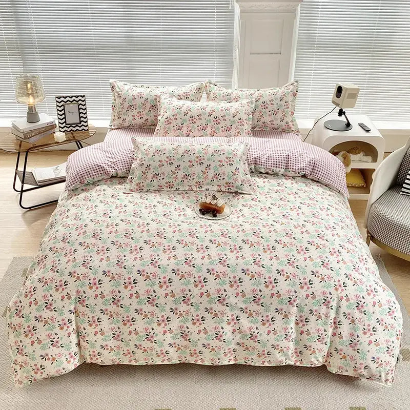 Cream-colored duvet cover with decorbites cute pattern featuring pink and mint floral design on soft bedding set