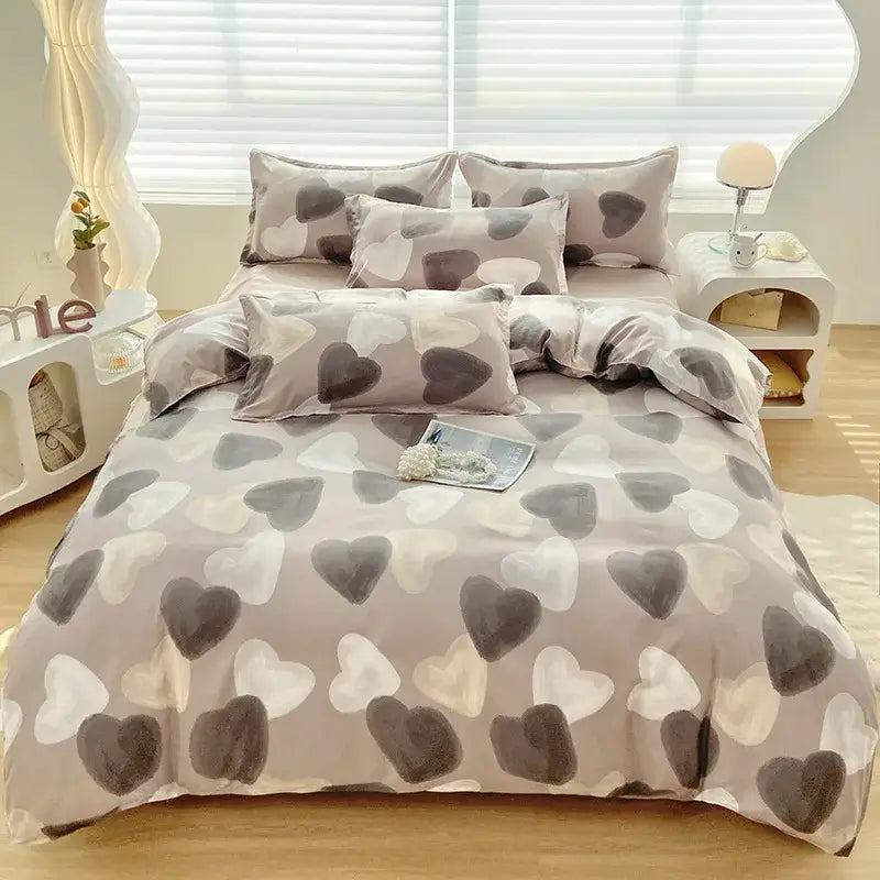 A cozy gray duvet cover with a soft heart-patterned design in white and dark gray by decorbites cute pattern