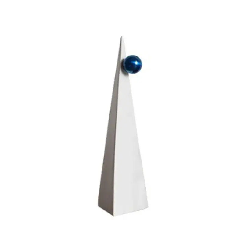 Abstract white ceramic geometric triangle decor topped with a glossy blue sphere for modern living room decorbites geometric triangle