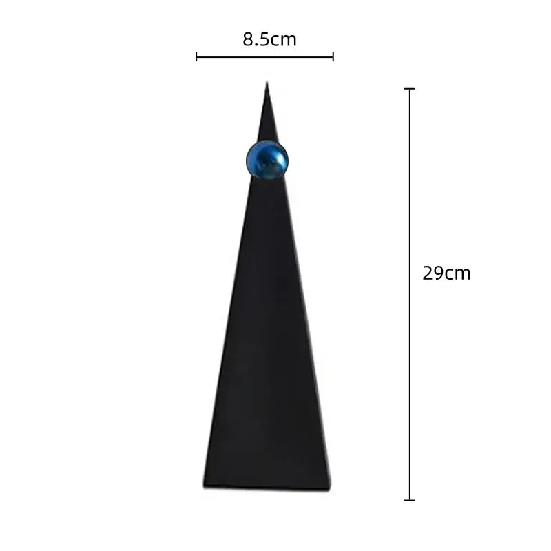 Black triangular decorative stand with a geometric triangle blue metallic sphere for living room decorbites geometric triangle decor