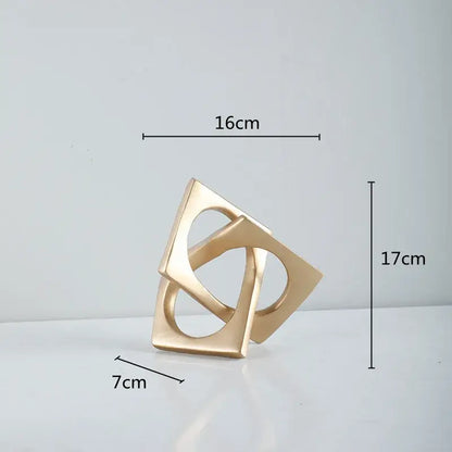 Gold-colored geometric cross square ceramic ring bookends with interlocking square shapes for living room decorbites decor