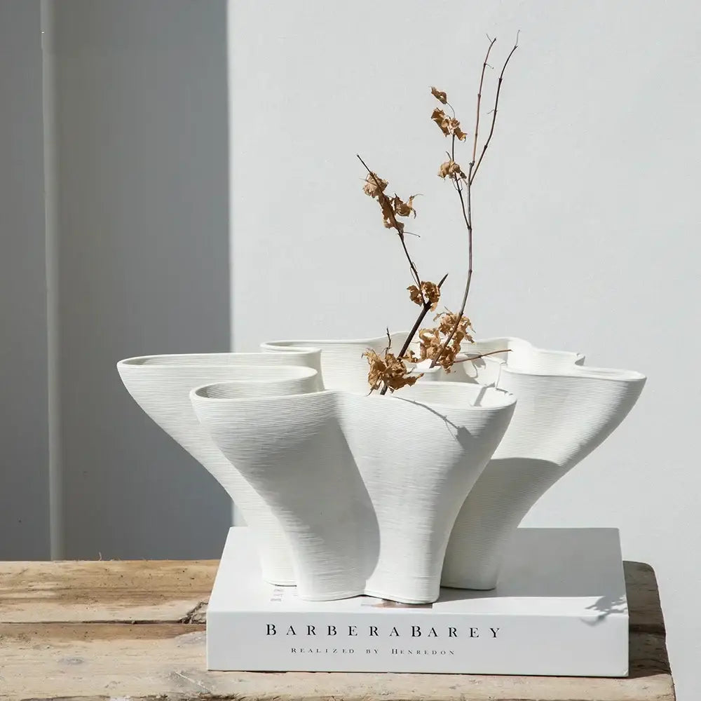 Abstract white geometric fold ceramic vase with sculptural interconnected design and subtle textured surface for decorbites geometric fold decor